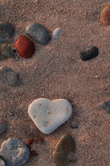 heart shape stone on the beach