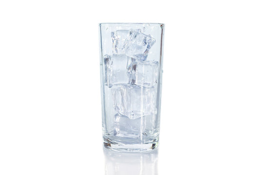 Glass of ice cube on white background.