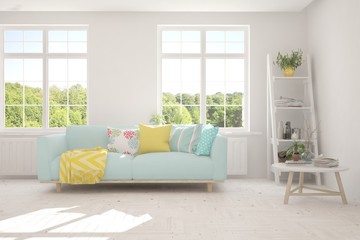Stylish room in white color with sofa and summer landscape in window. Scandinavian interior design. 3D illustration