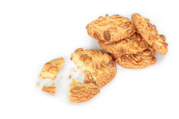 peanut cookie broken on white background.