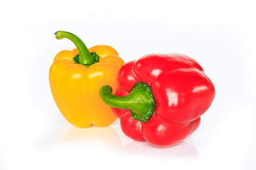 red and yellow bell pepper on white background.