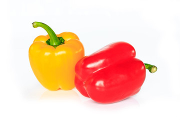 red and yellow bell pepper on white background.