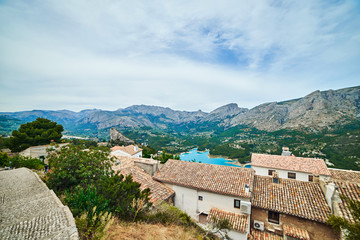 Fototapeta na wymiar The beautiful view from San Jose Castle overlooking the picturesque landscape in Guadalest.