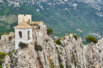 Fototapeta na wymiar The beautiful view from San Jose Castle overlooking the picturesque landscape in Guadalest.