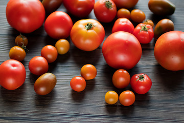 tomatoes on a wooden background