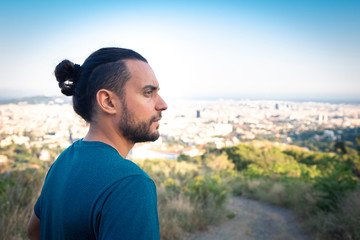 Portrait of a handsome man on a mountain