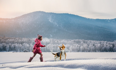 Having winter fun with pet friend