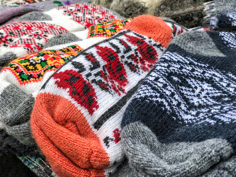 Pile Of Knitted Woven Socks At A Market