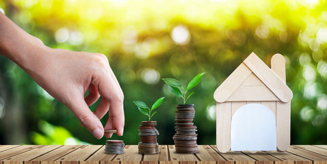 Saving money to buy a house in the future Real estate concept