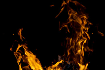 strong fire flames on black isolated background