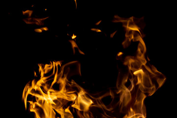 strong fire flames on black isolated background