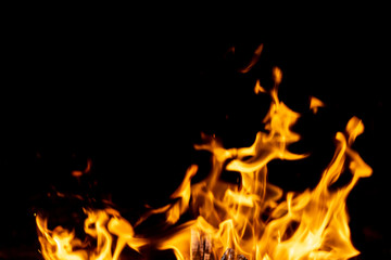 strong fire flames on black isolated background