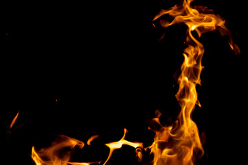 strong fire flames on black isolated background