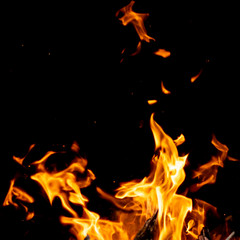 strong fire flames on black isolated background