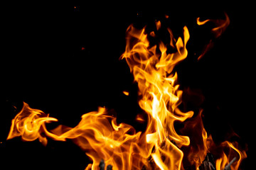 Obraz premium strong fire flames on black isolated background