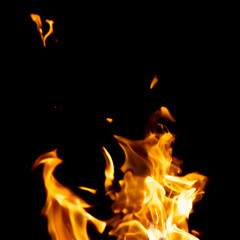 strong fire flames on black isolated background
