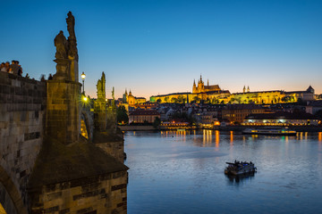 Fototapeta na wymiar Charles Bridge with Prague city skyline at night in Prague, Czech Republic