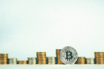 Closeup of bitcoin digital currency and coin money stack, Cryptocurrency money financial and business concept.