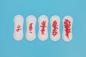 Top view sanitary towel with red sequins