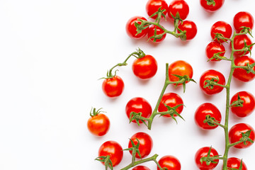 Fresh cherry tomatoes isolated on white background.