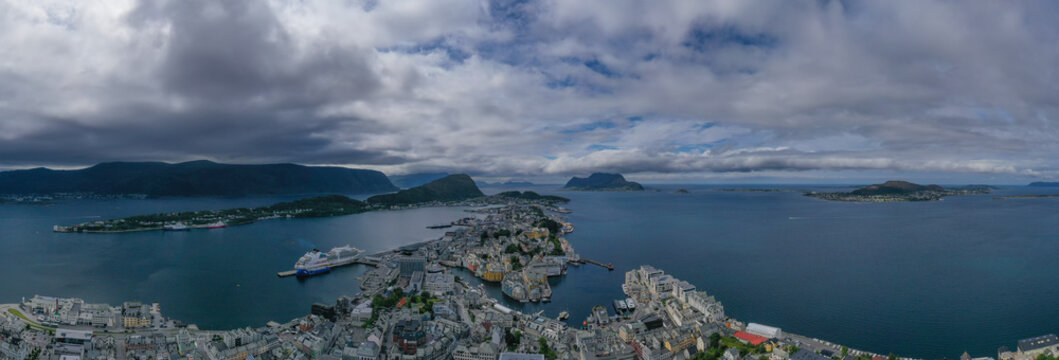 City Centre of Alesund from the Fjellstua Viewpoint on top of the mount Aksla, More og Romsdal, Norway. Panoramic aerial drone shot. July 2019