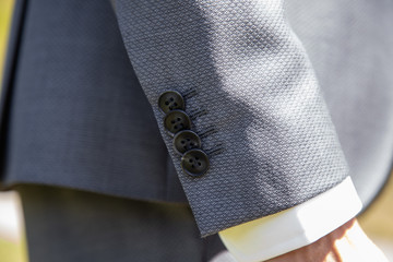 Détail du costard du marié