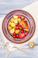 Roast chicken thighs and baby potatoes