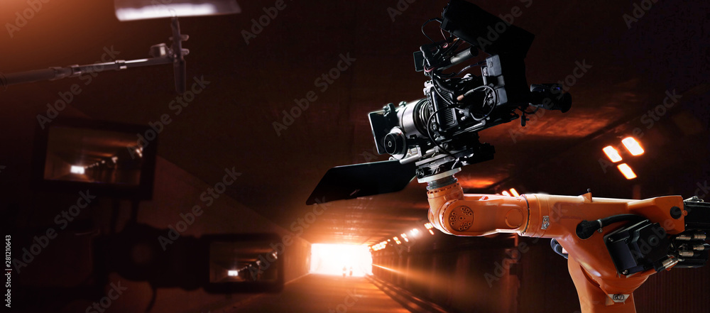 Poster Robotics automatic arms machine of making movie and TV commercial in studio. Camera of movie. Innovation and technology of movie industry with monitoring system software. Film crew team in set.