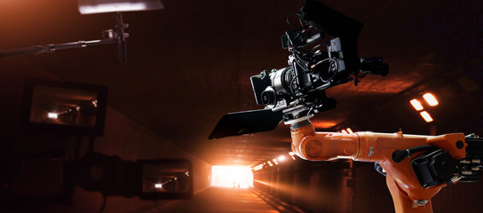 Robotics automatic arms machine of making movie and TV commercial in studio. Camera of movie....