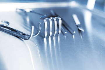 Stainless steel surgical instruments, forceps. Close up. Copy spase. Poster. placard, banner use....