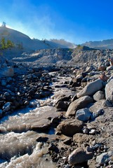 mountain stream through boulder field