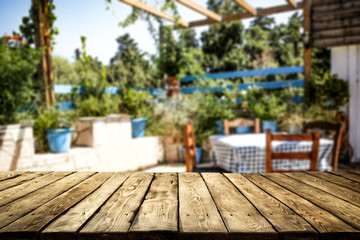 Desk of free space and restaurant background 