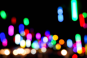 Blurred and bokeh with long short view reflection colorful lighting of city and night life. By the...