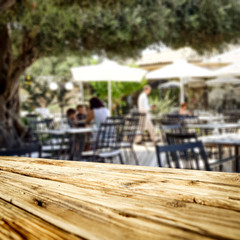 Desk of free space and restaurant background 