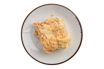 Napoleon cake on plate isolated on white