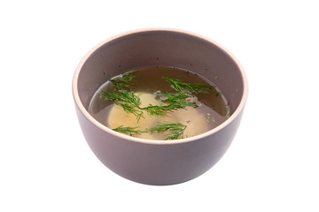 Chicken bouillon with egg isolated on white