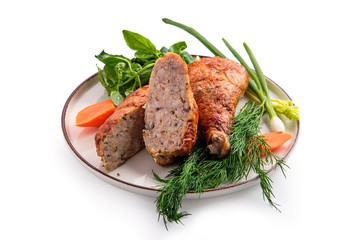 Stuffed chicken thigh decorated with spring onion, carrot, basil and dill