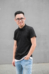 Korean man in a black t-shirt. Asian man with glasses.