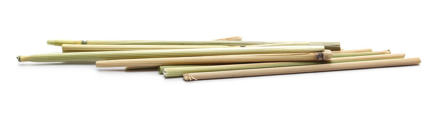 Dry straws, thatch, hay isolated on white background and texture