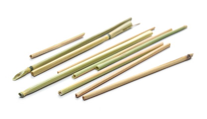 Dry straws, thatch, hay isolated on white background and texture