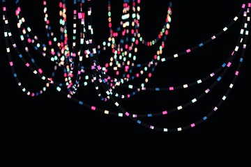 Blurred bokeh of party hanging lightining colorful wire garland. 3D Illustration