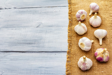 Fresh organic garlic on sackcloth