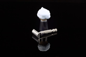 safety razor with foam brush.