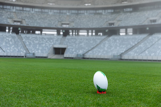 Rugby ball on a stand in stadium