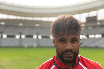 Rugby player looking at camera in the stadium