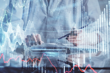 Financial chart drawn over hands taking notes background. Concept of research. Multi exposure