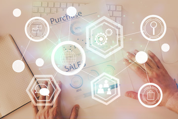 Man's hands working with notes background. Social networking scheme . Mixed media