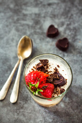 Dessert Vanilla panna cotta with fresh berries on gray background,.Top view. Holiday and comfort...