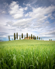 A farmhouse between Tuscan hills. Pienza, Val d'Orcia, Tuscany, Italy.