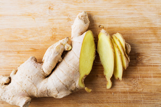 Fresh ginger on chopping board